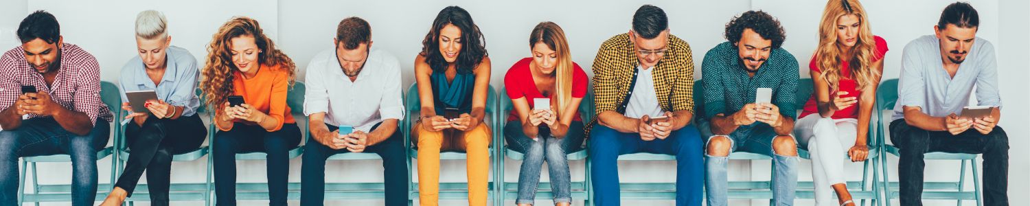 Phone Users Engaging With Social Media Advertising While Waiting In A Queue
